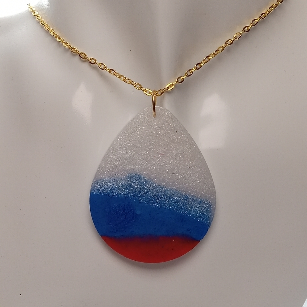 Elegant Gold Chain Necklace with Red, Blue, and White Pendant
